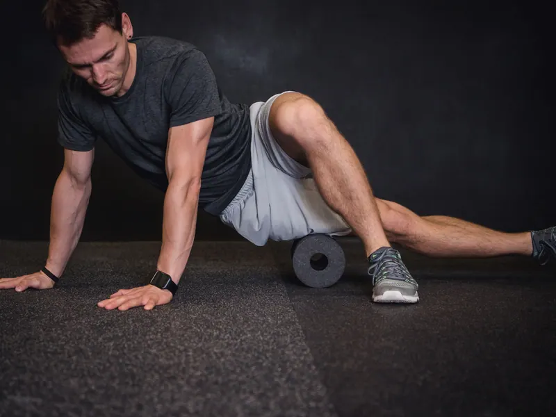 Releasing the leg on a foam roller